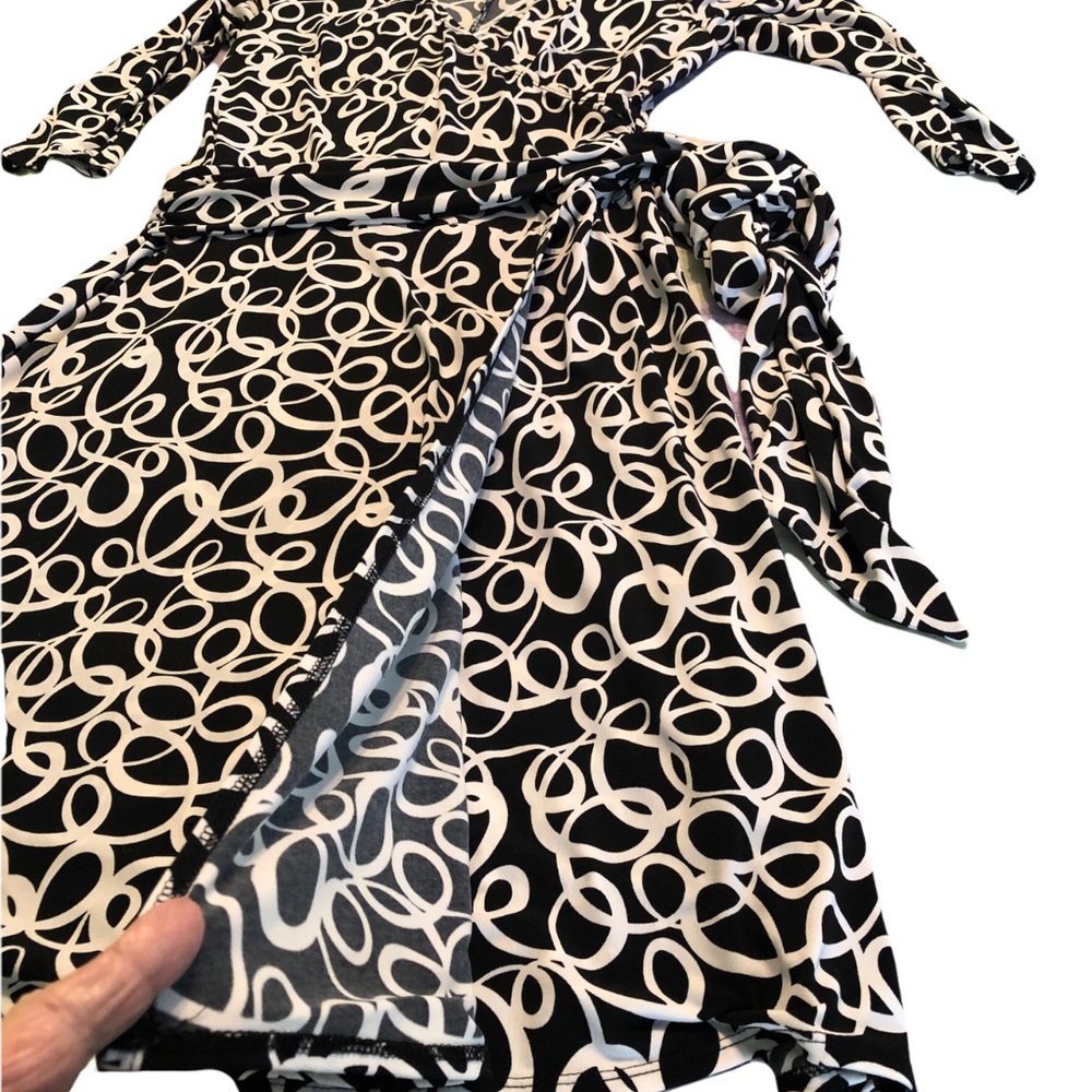 Size 10 polyester/spandex 3/4 sleeve rust cross sash knee length by ABG